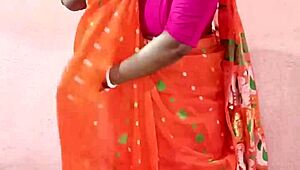 chubby indian woman in saree posing