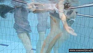 shaved brunette with big tits bathes in pool and shower underwater