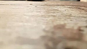 Wife caught masturbating pussy with showerhead in bath.