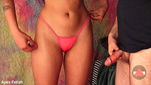 She begs for a panty fuck with close-up on her legs and pussy.