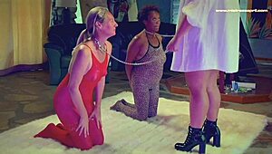 Ebony dominatrix Mistress April trains Rosie in pee toilet slavery with deepthroat and assfucking.