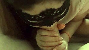 Whore grabs big cock for quick suck in homemade setup