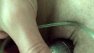 In this video dated March 3, 2018, a male dominates using toys in a bisexual encounter