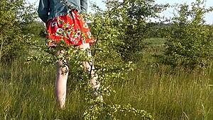 Beautiful brunette teen exposes hairy pussy outdoors in short skirt for doggystyle