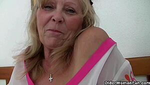 granny shows off her big tits but then the photographer starts fingering her deeply
