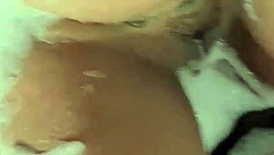 Brunette's pussy fucked in bubble bath