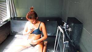 Wet Asian Brunette Fingers Herself In Whirlpool