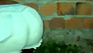 Neighbor with large buttocks cleans the backyard