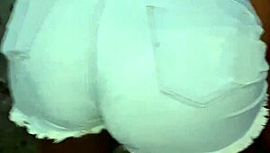 Neighbor with large buttocks cleans the backyard