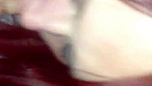 Redhead passionately sucking cock with intense blowjob action