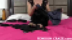 Femdom mistress makes sub put on panties to check fit in bdsm scene.