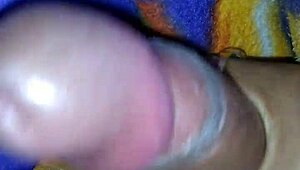 Intense handjob on monster cock during bed masturbation