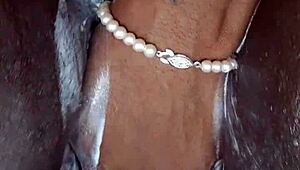 Black milf shaves her wet pussy for orgasm. She uses toys in homemade close-up.