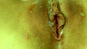 Cute girl with glasses masturbates with big dildo