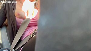 Artemisia Love flashes her big boobs during a horny car ride.
