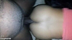 in this amateur couple's story, the black partner bends over on the sofa for a nice doggystyle session while bound