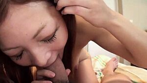 Japan Teen in Stockings Delivers Intense Blowjob and Fingering Session with Milf