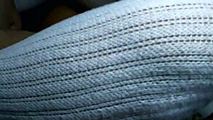 Student and Stepmother Share Intimate Moment in Living Room