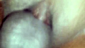 Mature woman receives intense massage session.