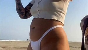 Redhead Flashes Swollen Pussy Lips on Beach