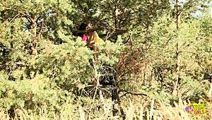 Outdoor lesbian babes use dildos passionately