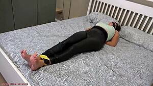 Why is Susy Blue bound, gagged, blindfolded, and tickled by a masked man?