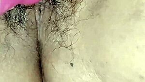 Mature woman at home plays with her dildo