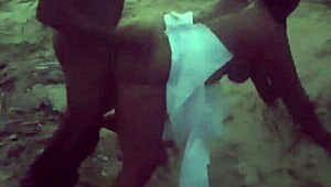 wild outdoor night fuck under the stars, contrasting passion and danger in the darkness