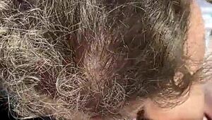 Plump Woman Gives Intense Blowjob in Public Outdoor Setting While Being Watched