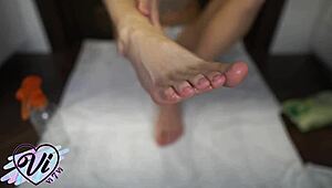 brunette shows her feet closeup