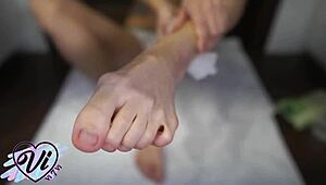 brunette shows her feet closeup