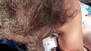 Plump Woman Gives Intense Blowjob in Public Outdoor Setting While Being Watched