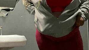 Milf gets backshots in bar bathroom