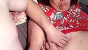 Step mom strokes Johnny's cock.