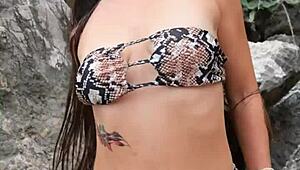 i saw this hottie flashin her boobs in a sexy bikini on the beach, it was so hot