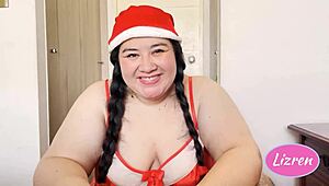 Lizren says, Come here for my special Christmas blowjob, deepthroating your fat cock with my curvy body