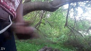 outdoor masturbation session ends with a cum shot in the trees