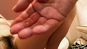 Pretty Asian Brunette Rie Obata Kneads Her Hairy Pussy With A Vibrator