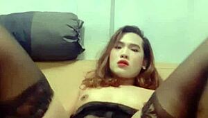 Ladyboy Mint jerks off and swallows cum.