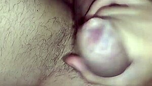 Sticking magnets into piercing holes on penis