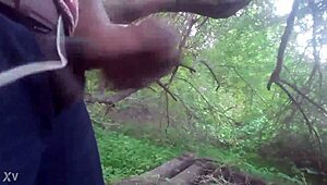 outdoor masturbation session ends with a cum shot in the trees
