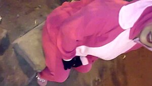 a mature woman in halloween costume gives a free blowjob outdoors