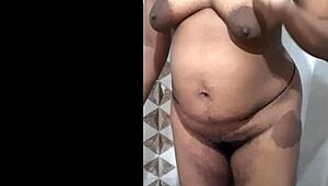 best xxx indian hot brownie step mom pisses in bath room, her hairy pussy and big ass on display