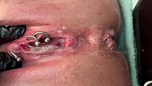 Woman Rubs Pierced Area With Gloves And Experiences Strong Urination