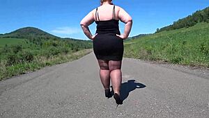 Mature bbw in nylon pantyhose and high heels walks public road. Foot fetish big booty asmr.