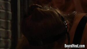 two hot lesbian slaves get tied up and dominated by a fierce mistress