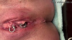 Woman Rubs Pierced Area With Gloves And Experiences Strong Urination