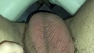 Sticking magnets into piercing holes on penis