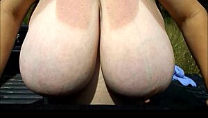 Cute girl with huge boobs chats casually