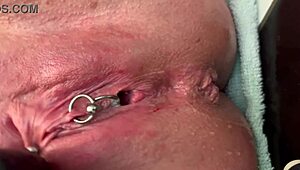 Woman Rubs Pierced Area With Gloves And Experiences Strong Urination